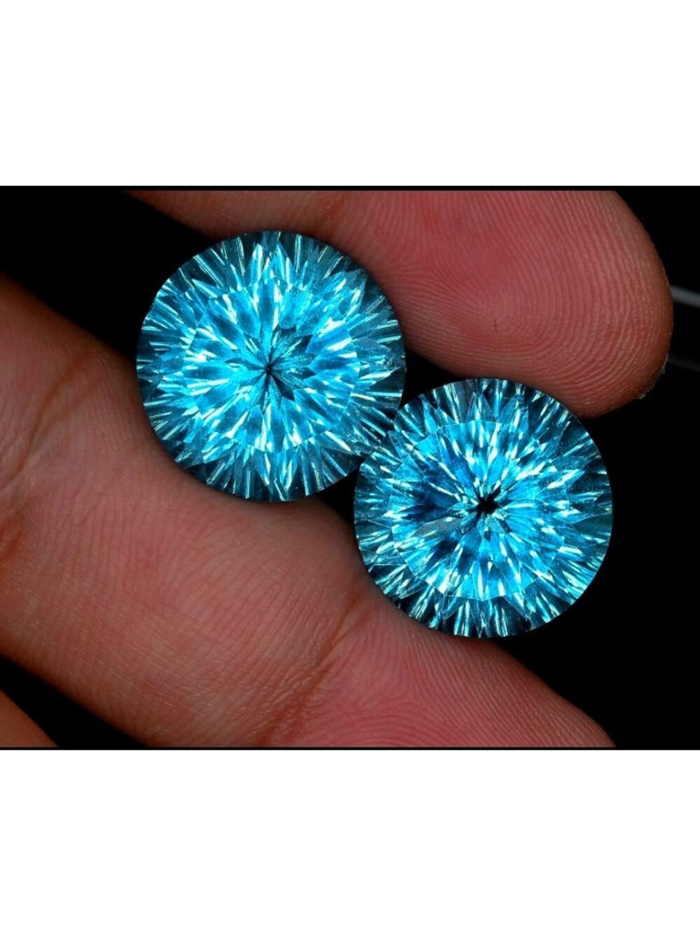 Wowww!! 41 TCW Fancy Laser Cut VVS Blue Topaz Pair!!